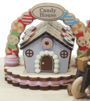 Wooden music box candy house close up view