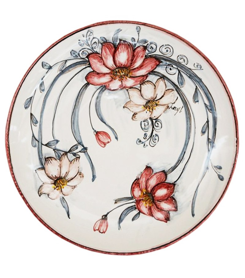 Ceramic cupped plate.